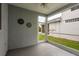 The screened in lanai has views of the backyard and easy access to outside at 9106 Crystal Commons Way, Tampa, FL 33626