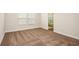 Bright bedroom with neutral carpet and walls, offering a peaceful and inviting space at 10025 Surrey Rose Dr, San Antonio, FL 33576