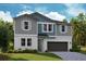 Charming two-story home with a grey and blue color scheme, landscaped yard, and a two-car garage at 10025 Surrey Rose Dr, San Antonio, FL 33576