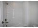 Clean bathroom showcasing a white tiled shower and tub combination at 10243 Fieldstone Myrtle Way, San Antonio, FL 33576