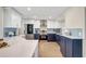 Modern kitchen features white cabinets, stainless steel appliances, and backsplash detail at 10884 118Th St, Seminole, FL 33778