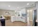 Bright kitchen with wood floors, white cabinets and an eat-in dining area at 10884 118Th St, Seminole, FL 33778