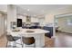 Beautiful kitchen with stainless steel appliances, white counters, and breakfast bar seating at 10884 118Th St, Seminole, FL 33778