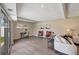 Spacious living room boasts wood floors, recessed lighting and sliding door access at 10884 118Th St, Seminole, FL 33778