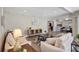 Living room features an open floor plan, wood floors and recessed lighting at 10884 118Th St, Seminole, FL 33778