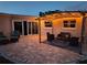 Inviting outdoor patio featuring a stylish pergola with string lights, perfect for evening relaxation and entertaining at 10884 118Th St, Seminole, FL 33778