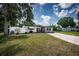 Charming single-story home with a well-manicured lawn and inviting curb appeal at 11831 104Th Ln, Largo, FL 33773