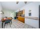 Eat-in kitchen featuring stainless steel appliances, and view to the backyard at 11831 104Th Ln, Largo, FL 33773