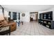 Cozy living room with tile flooring, neutral walls, and comfortable seating area at 11831 104Th Ln, Largo, FL 33773