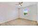 Bedroom features carpeted floors, a ceiling fan, and view of the lake at 11911 Greenchop Pl, Riverview, FL 33579