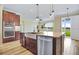 Gourmet kitchen featuring stainless steel appliances, barstool seating, and an undermount kitchen sink at 11911 Greenchop Pl, Riverview, FL 33579
