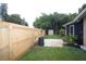 Private fenced backyard featuring a patio perfect for outdoor entertaining at 11928 Mandarin Ct, Seminole, FL 33772