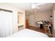 Functional bedroom space with vanity, closet, and a dedicated desk space for working from home at 11928 Mandarin Ct, Seminole, FL 33772