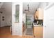 Galley kitchen with sleek stainless steel appliances, ample cabinet space, and tile flooring and decor at 11928 Mandarin Ct, Seminole, FL 33772