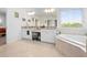 Bright bathroom features double sinks, granite counters, and a soaking tub at 12107 Nouveau Ave, Spring Hill, FL 34610
