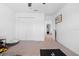 Bright bedroom with a closet, neutral carpet, and a cute name decoration on the wall at 12107 Nouveau Ave, Spring Hill, FL 34610