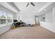 Spacious loft area with natural light, neutral carpet, providing a versatile space at 12107 Nouveau Ave, Spring Hill, FL 34610