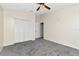 Bedroom has closet and a ceiling fan with light fixture at 12653 Longcrest Dr, Riverview, FL 33579