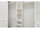 This walk-in closet offers adjustable shelving and ample storage space at 12653 Longcrest Dr, Riverview, FL 33579