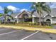 Image of the Community Center with ample parking and landscaping at 12653 Longcrest Dr, Riverview, FL 33579