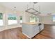 Stylish kitchen featuring a butcher block island with seating and stainless steel dishwasher at 12653 Longcrest Dr, Riverview, FL 33579