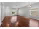Spacious living room featuring hardwood floors, neutral paint and lots of natural light at 13423 Lake Monroe Pl, Riverview, FL 33579