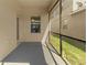 Screened patio overlooking the backyard, providing a relaxing outdoor space at 13423 Lake Monroe Pl, Riverview, FL 33579