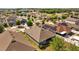 Aerial view of a home nestled in a residential neighborhood at 14434 Scottburgh Glen Dr, Wimauma, FL 33598