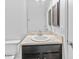 Bathroom featuring a vanity with granite countertop and dark brown cabinets at 14434 Scottburgh Glen Dr, Wimauma, FL 33598