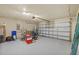View of garage with ample space for parking and storage at 14434 Scottburgh Glen Dr, Wimauma, FL 33598