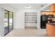 Bright dining area featuring a pantry and sliding glass doors to the outdoor area at 16139 Villa Dr, Hudson, FL 34667