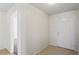 Inviting entryway with neutral walls, tile flooring, and a view into the home at 16139 Villa Dr, Hudson, FL 34667