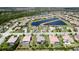 Aerial view of a neighborhood with homes, landscaping, and multiple lakes and ponds at 16612 5Th E Ave, Bradenton, FL 34212