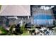 Aerial shot showcases the pool, screened enclosure, and outdoor kitchen at 16612 5Th E Ave, Bradenton, FL 34212