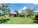 Large backyard and screened-in outdoor living space provide ample entertaining opportunities at 16612 5Th E Ave, Bradenton, FL 34212