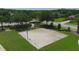 Community basketball court surrounded by green space and walking paths at 16612 5Th E Ave, Bradenton, FL 34212