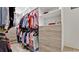 Organized walk-in closet with ample storage including shelves, drawers, and hanging space at 16612 5Th E Ave, Bradenton, FL 34212