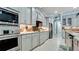 Well-equipped kitchen with modern appliances, custom cabinetry, and a sleek design for culinary enthusiasts at 16612 5Th E Ave, Bradenton, FL 34212