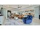 Bright and airy living room showcasing modern furnishings, an open floor plan, and ample natural light at 16612 5Th E Ave, Bradenton, FL 34212