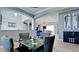 Open-concept living space with elegant archways connecting dining and living areas at 16612 5Th E Ave, Bradenton, FL 34212