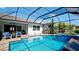 Enjoy the crystal-clear pool and spa with screened enclosure at 16612 5Th E Ave, Bradenton, FL 34212