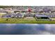 A serene lake view of the homes backyard with a location marker at 16633 Sunburst Lake S St, Wimauma, FL 33598