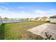 The backyard faces a large lake, plus there's a brick paver patio area at 16633 Sunburst Lake S St, Wimauma, FL 33598