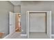 Bedroom closet with bi-fold doors and a view to the hallway at 1742 Oakwood Estates Dr, Plant City, FL 33563