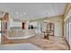 Open living area with kitchen featuring granite countertops, modern appliances, and pantry at 1742 Oakwood Estates Dr, Plant City, FL 33563