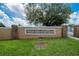 Stone and stucco sign welcomes you to Oakwood Estates at 1742 Oakwood Estates Dr, Plant City, FL 33563