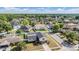 Neighborhood aerial view featuring lush trees, diverse home styles, and quiet streets at 206 Soldier Ct, Seffner, FL 33584