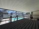 Screened-in deck overlooking swimming pool and fenced backyard at 206 Soldier Ct, Seffner, FL 33584