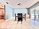 Bright dining room featuring tile floors and sliding glass doors to the outdoor patio at 206 Soldier Ct, Seffner, FL 33584