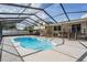 Backyard enclosed pool with seating area, making it perfect for entertaining friends and Gathering at 206 Soldier Ct, Seffner, FL 33584